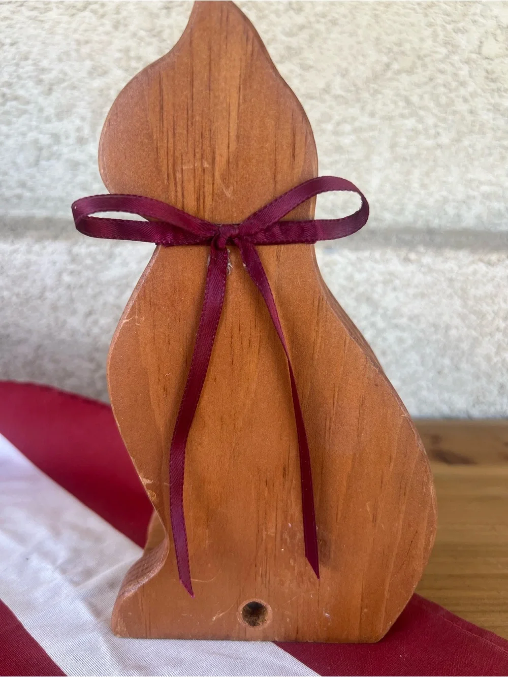 Wooden Cat Figurine with Burgundy Ribbon